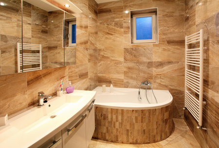 bathroom in luxury home with bath and furnitureのeditorial素材