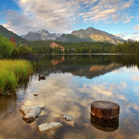 Mountain Lake in Slovakia Tatra - Strbske Pleso with dramatic cloudsの写真素材