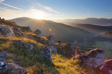 Mountain panorama with sunの写真素材