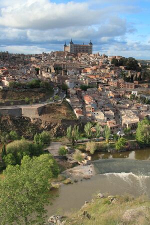  view in the old city in Toledo with rainbow. Spainの写真素材