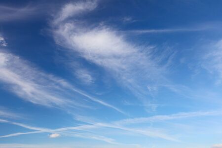  deep blue sky with fluffy white clouds