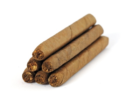 Heap of cigars isolated on whiteの写真素材
