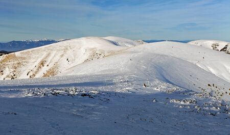 WInter mountains landscape with blue sky in summer sunny dayの写真素材