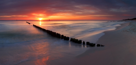 Baltic sea at beautiful sunrise in Poland beach.の写真素材