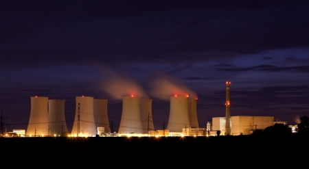 Nuclear power plant by nightの写真素材