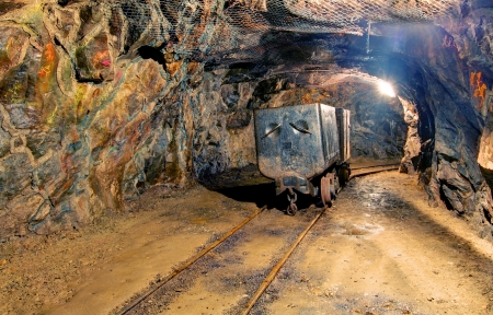 Underground mine with truck and railroad