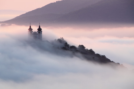 Calvary over clouds in Banska Stiavnica, Slovakiaの写真素材
