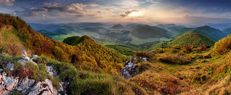 Green Spring Slovakia mountain nature landscape with sun and crossの写真素材