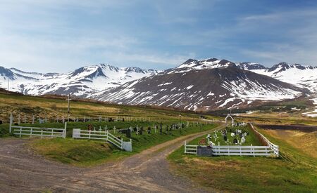 Iceland summer landscape. Fjord, house, mountainsの写真素材