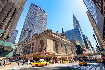 NEW YORK CITY - APRIL 14, 2016: Rush of pedestrians outside historic Grand Central Terminal in NYC. The world's largest train stationのeditorial素材