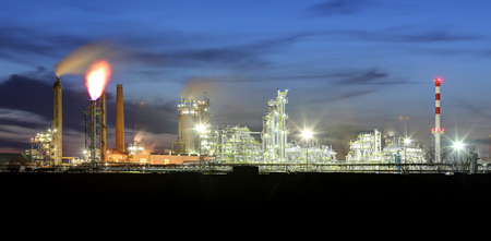 Petrochemical plant at night, oil and gas industrial