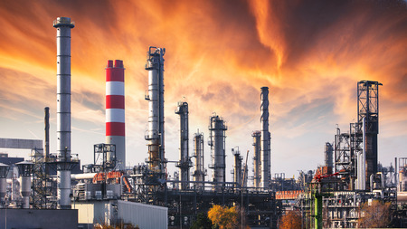 Oil refinery at dramatic twilight