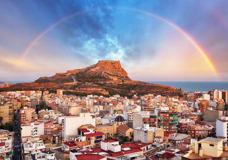 Alicante in Spain at sunset with rainbowの写真素材