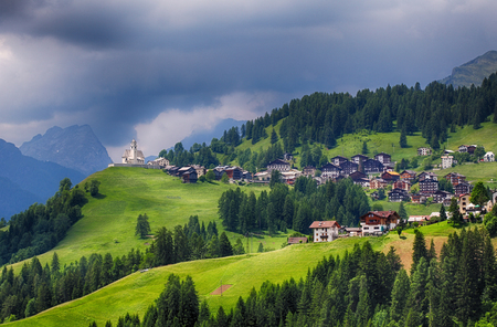 Mountain village with house in Dolomitesの写真素材