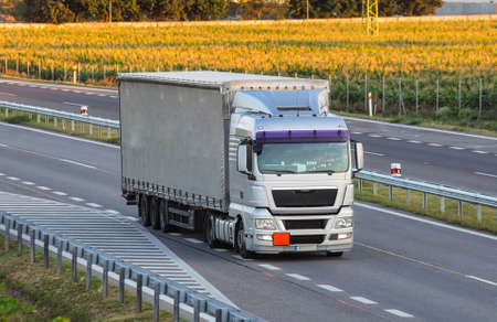 Highway transportation with cars and Truck