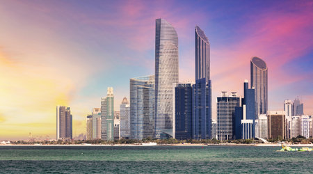 Abu Dhabi skyline with reflection in sea, United Arab Emirates - panoramaのeditorial素材