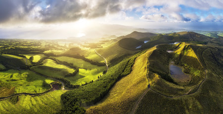 Azores - Aerial view of the volcanic mountains and lakes, with green farmland of Sete Cidades on Sao Miguel Island,  Portugalの写真素材