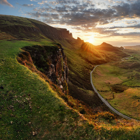 Landscape - Dramatic sunrise sky over the Quiraing hills on the Trotternish peninsula on the Isle of Skye in the Highlands of Scotlandの写真素材