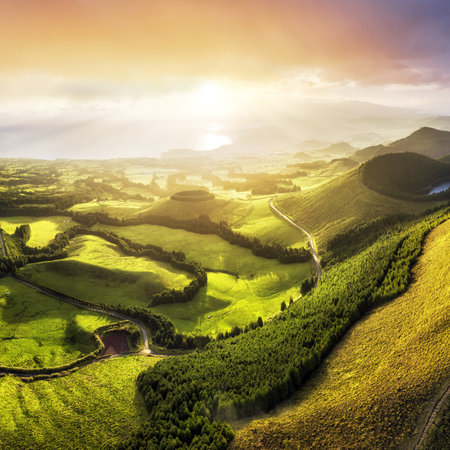 Sunrise landscape with Vulcanic Lake, mountain and sun, Sao Miguel Island, Azores, Portugalの写真素材