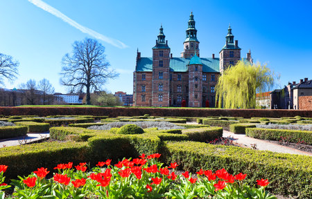 Rosenborg Castle in Copenhagen with red tulips, Denmarkの写真素材