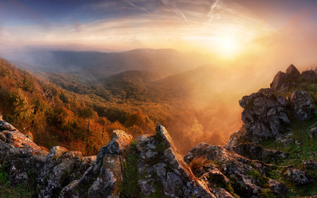 Majestic sunset in the mountains landscape with sunny beams. Dramatic scene. Carpathian, Slovakia, Europe.の写真素材