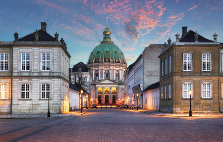 Copenhagen - Beautiful fountain at the Royal Palace Amalienborg at dramatic sunrise. Royal residence, Denmarkの写真素材