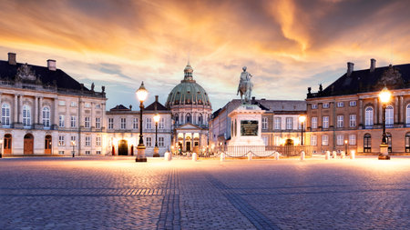 Sunrise view of Marmorkirken - Frederik's Church in Copenhagen - Amalienborg, Denmark. Captivating architecture with a majestic green dome and intricate details under a clear sky. Perfect for travel and histの写真素材