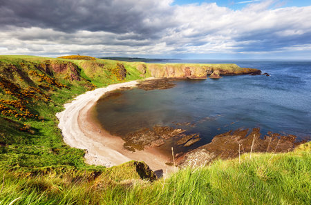 Panorama of Dunnottar castle with sea coast in Scotlandの写真素材