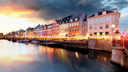 Copenhagen Nyhavn, New port of Copenhagen, sunset in Denmark