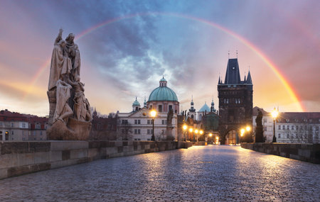 Charles Bridge (Karluv Most) over River Vltava with rainbow, UNESCO World Heritage Site, Prague, Czech Republic, Europeの写真素材