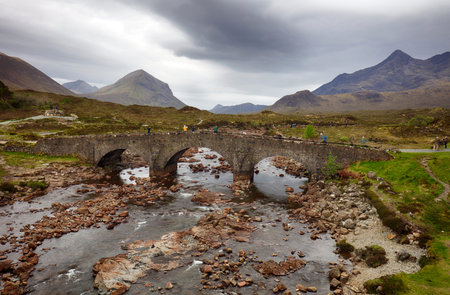 Sligachan Old Bridge with beautiful view on Black Cuillin mountains, in Isle of Skye, Scotland, UKの写真素材