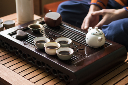 Exquisite Hot Tea in Teapot at Traditional Chinese Tea Ceremony. Set of Equipment