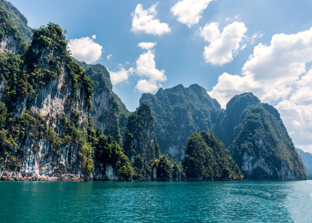 High epic limestone cliffs at Cheow Lan lake, Khao Sok National Park, Suratthani, Thailand.の写真素材