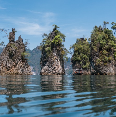 Three epic limestone cliffs at Cheow Lan lake ,Khao Sok National Park,Suratthani,Thailand.の写真素材
