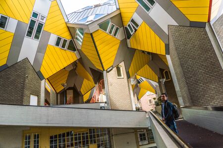ROTTERDAM, THE NETHERLANDS - AUG 23, 2018: Yellow Cubic houses and apartments in Rotterdam. The Netherlandsのeditorial素材