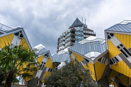 ROTTERDAM, THE NETHERLANDS - AUG 23, 2018: Yellow Cubic houses and apartments in Rotterdam. The Netherlandsのeditorial素材
