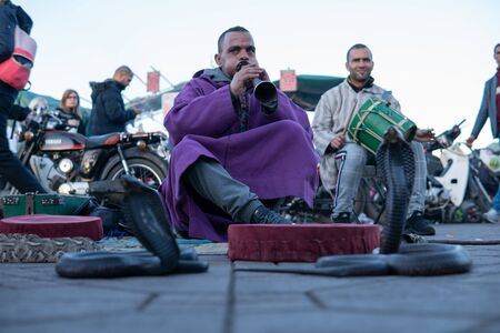 MARRAKESH, MOROCCO - 15 JAN 2019: Snake charmer at the Jemaa el-Fnaa square in Marrakesh, Moroccoのeditorial素材