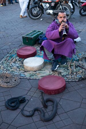 MARRAKESH, MOROCCO - 15 JAN 2019: Snake charmer at the Jemaa el-Fnaa square in Marrakesh, Moroccoのeditorial素材