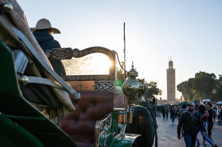 Marrakesh, Morocco - January 2019 : horse-drawn carriage cab waiting for passengers for tour in Jemaa el Fna squareのeditorial素材