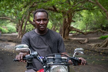 TANZANIA, MASAI VILLAGE - JANUARY 2020: Portrait of Maasai man people in native masai village Engare Sero on the coast of Natron Lake in Maasailand, Arusha districtのeditorial素材