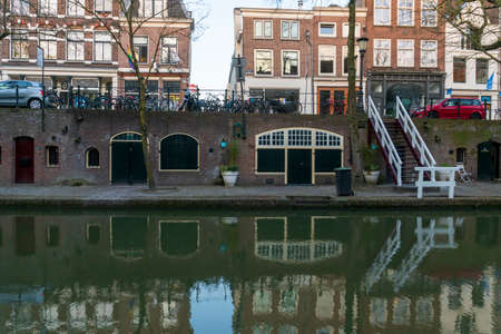 Canal in Utrecht, Netherlands. Old Dutch houses along the canalの写真素材