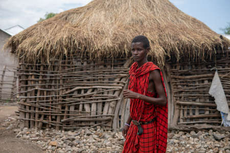 TANZANIA, MASAI VILLAGE - JANUARY 2020: Portrait of Maasai man people in native masai village Engare Sero on the coast of Natron Lake in Maasailand, Arusha districtのeditorial素材