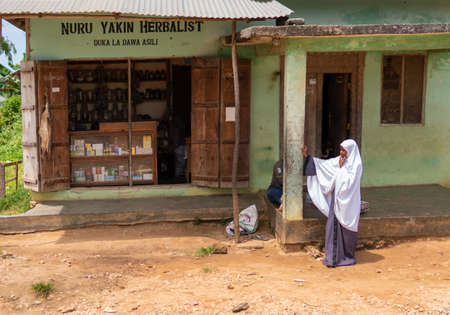 Zanzibar, Tanzania - JANUARY 2020: Black African People in their Usual Lifestyle on Streets of Zanzibar Villageのeditorial素材