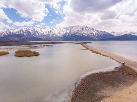 Aerial view of Highland Floodplains where Donemec River connecting to Lake Van surrounded with Mountains and Creating Thin Sandy Spit. Van is the largest lake in Turkeyの写真素材