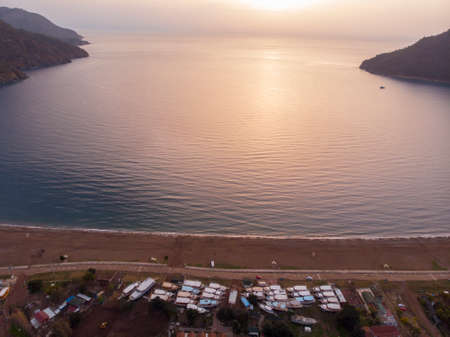Aerial Shots of Adrasan. Boats are waiting for the High Season While Standing on the Ground Seaside view from Adrasan Beach along the Mediterranean coast in Kemer, Antalya Province, Turkeyの写真素材