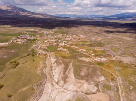 Aerial View on Anatolian Village with Clay roofs at Foothill of Mount Ararat in Eastern Anatolia, Turkeyの写真素材