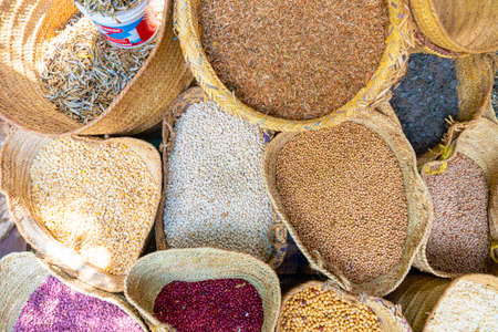 Assortment of dry beans in for sale at a local street food market in Mto Wa Mbu, Arusha, Tanzania, east Africaの写真素材