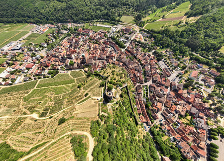 Aerial Drone Shot of the village of Kaysersberg in Alsace in a day. Summer in France, Castle and a beautiful Cityの写真素材