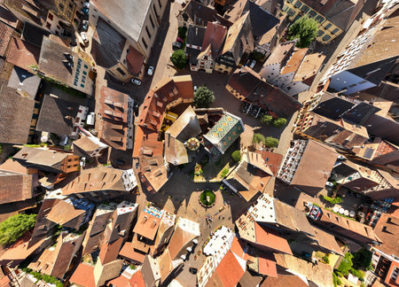 Top view on Eguisheim village in the Alsace province, France. Picturesque site at Sunny Summer Day. Aerial Drone Shotの写真素材