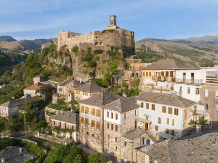 Gjirokaster castle with Clock tower, ottoman architecture houses in Albania, Unesco World Heritage Site, ancient townの写真素材